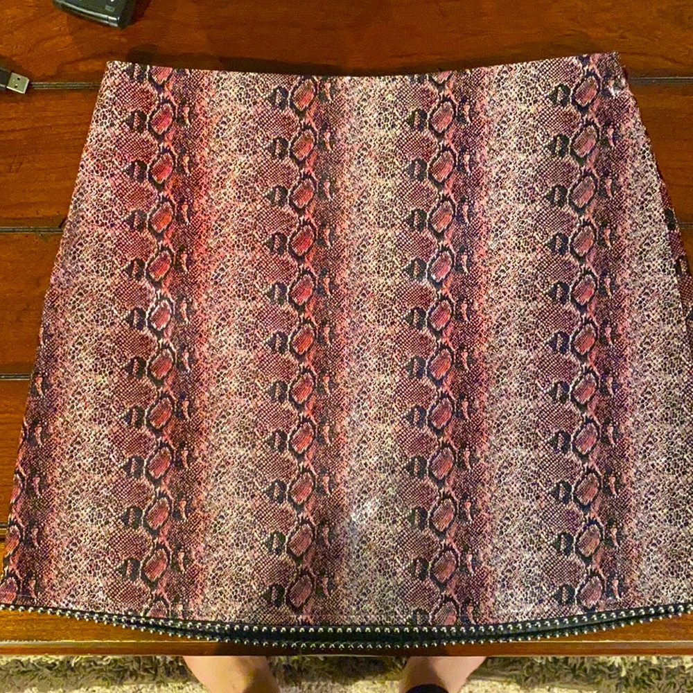 Boutique feaux leather pink and black snake skin skirt.